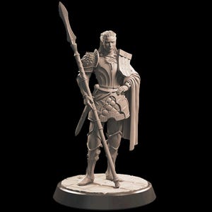 May include: A detailed figurine of a warrior in ornate armor, holding a spear and a sword. The figure stands on a circular base with a textured surface. The warrior is wearing a cape and has long hair.