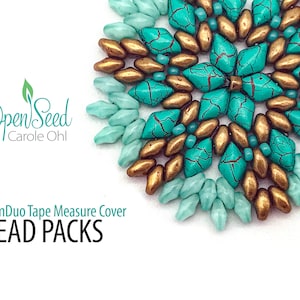 May include: A close-up of a circular bead design in shades of turquoise, gold, and teal. The design is made of various shaped beads. The text "Open Seed Carole Ohl" and "GemDuo Tape Measure Cover BEAD PACKS" are visible.