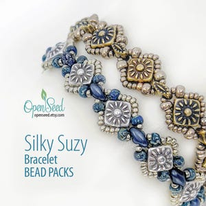 May include: Two beaded bracelets with silver and gold square beads with a flower design. The beads are interspersed with dark blue beads. The bracelets are called "Silky Suzy Bracelet Bead Packs".