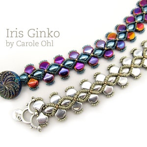 May include: Two beaded bracelets, one with iridescent purple, blue, and gold beads, and the other with silver beads. The bracelets are connected by a silver clasp. The text "Iris Ginko by Carole Ohl" is visible in the image.