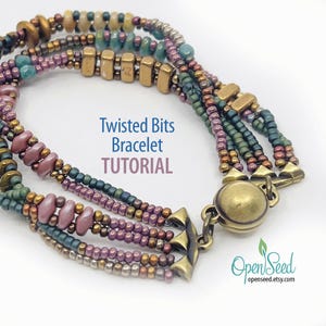 May include: A multi-strand bracelet with a variety of beads in shades of purple, green, gold, and teal. The bracelet has a decorative clasp and the text "Twisted Bits Bracelet TUTORIAL".