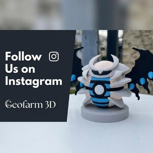 May include: A 3D printed figurine featuring a spherical body with blue and black horizontal stripes, encased in grey pointed armor plates. It has black wing-like appendages with blue accents and stands on a circular grey base. Text reads Follow Us on Instagram Geofarm 3D.