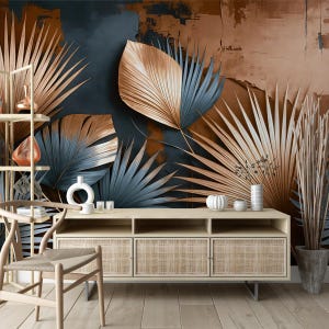 May include: A contemporary living room setting with a light wood entertainment unit with woven cane doors, a wooden chair, and a decorative shelf. The backdrop is a mural with large, stylized palm leaves in blue, gold, and brown.