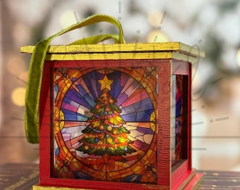 May include: A red and gold Christmas-themed lantern with a stained-glass design. The lantern features a Christmas tree with colorful ornaments and a star on top. The text "DIGITAL FILE ONLY" is displayed at the top.