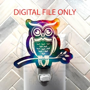 May include: A colorful owl nightlight with a watercolor effect. The owl is perched on a branch with leaves. The nightlight is plugged into an outlet.