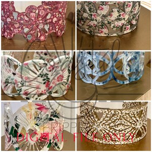 May include: Four different patterned decorative bands, each with a unique design. The bands are made of a white material with a variety of patterns, including floral, geometric, and abstract designs. The bands are all approximately 2 inches wide and are perfect for adding a touch of style to any project.