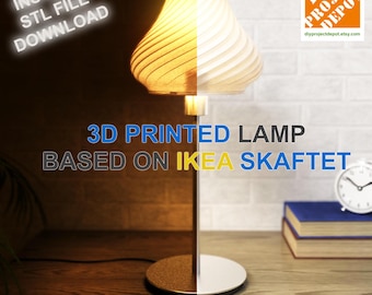 May include: A 3D printed lamp based on the IKEA Skaftet lamp. The lamp has a white shade with a spiral design and a gold base. The lamp is on a wooden table with a book and a clock. The text "DIY Project Depot" is in the upper right corner of the image. The text "Total cost under 20€!" is at the bottom of the image.