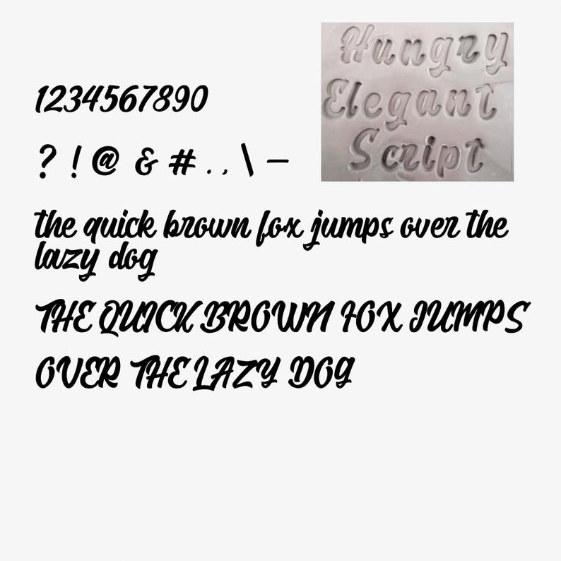 May include: A white background displays various fonts and characters. The image includes the numbers 1234567890, punctuation marks, and the phrase "the quick brown fox jumps over the lazy dog" in both lowercase and uppercase.