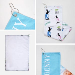 May include: Golf towels with a metal hook for hanging. One towel is light blue with a white letter "Y". Another towel is white with golf-themed graphics and the text "BEST FRIEND BY PAR". The third towel is light blue with the name "BENNY".