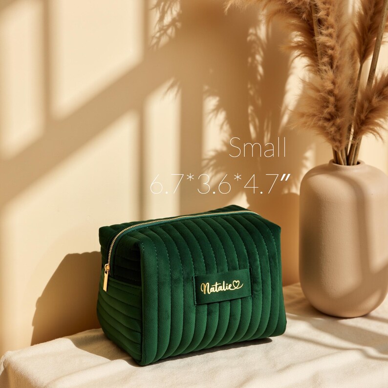 a small green purse sitting on top of a table
