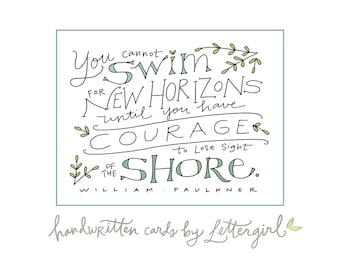 May include: Handwritten quote card with green foliage and a blue and black handwritten quote that reads "You cannot swim for new horizons until you have the courage to lose sight of the shore." The quote is attributed to William Faulkner. The card also includes the text "handwritten cards by Lettergirl" in gray.