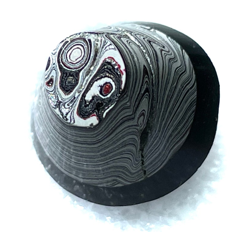 Pieces are Laminated Together Black Glass Base Hand-Faceted Button ~ Fordite Small