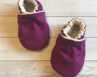 purple baby shoes