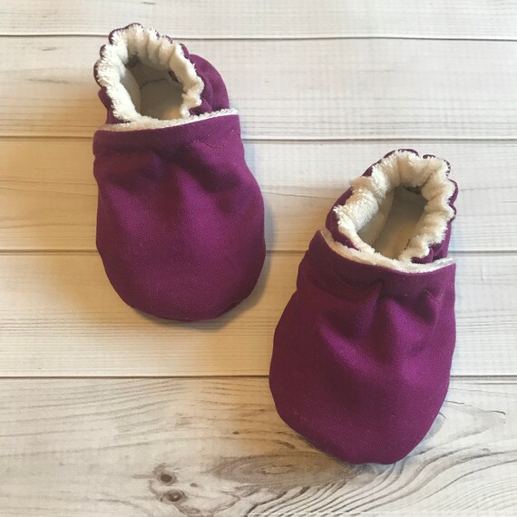 purple baby shoes