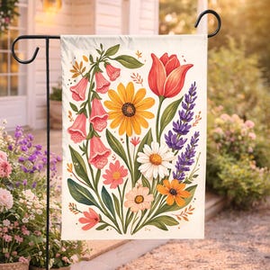 May include: A white ceramic mug with a black handle and the text "But First, Coffee" in a black, bold font. The mug is on a wooden surface.