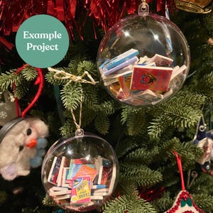 Example project featuring two clear ornaments with mini books inside, foam in between book covers, Printable Dollhouse Christmas Books Vintage Little Golden Christmas Book 1:12 Scale Dollhouse Printable DIY Mini Books Christmas Decor