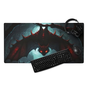 May include: A large rectangular mousepad featuring a detailed illustration of a red and black dragon with glowing eyes. The dragon is set against a dark, cavernous background. A black keyboard, mouse, and headphones are on the mousepad.
