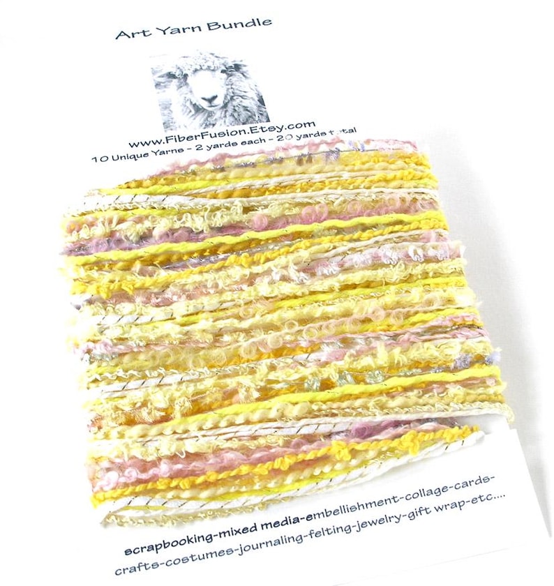 May include: Art yarn bundle featuring a mix of yellow, pink, and white yarns. The bundle includes 10 unique yarns, each 2 yards long, for a total of 20 yards. The yarn is suitable for scrapbooking, mixed media, and various crafts.