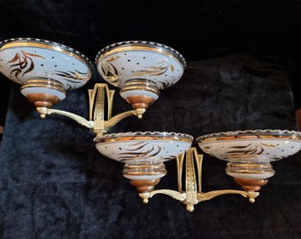 Pair of brass wall lights with two arms, Art Deco, France