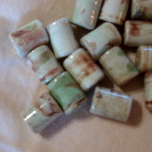 Barrel Beads Blue-Green, Aqua and Chestnut Brown on white porcelain about half inch diameter 3/4 inch  15 pieces B003