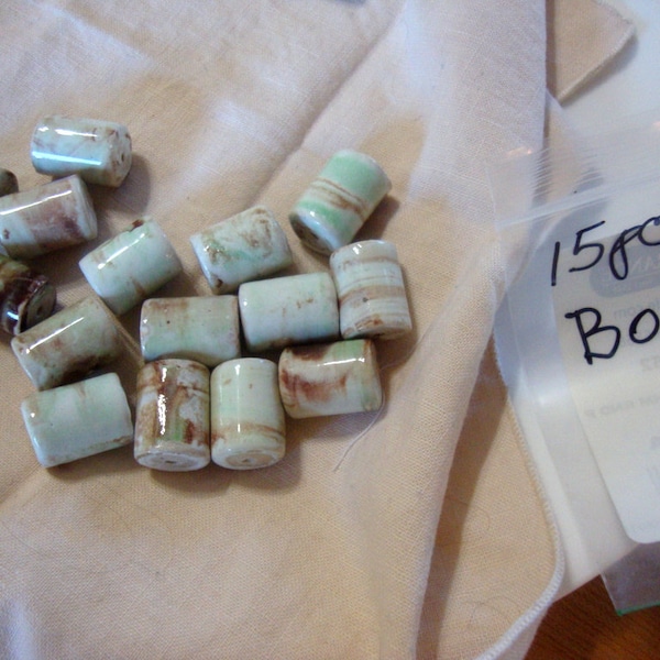 Barrel Beads Blue-Green, Aqua and Chestnut Brown on white porcelain about half inch diameter 3/4 inch  15 pieces B003