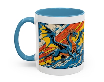 May include: White ceramic mug with a blue interior and handle. The mug features a colourful illustration of a blue dragon with yellow wings against a backdrop of clouds and a rainbow-coloured sky. The mug is a standard size.