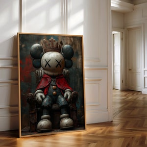 May include: A digital art print of a cartoon character wearing a crown and sitting on a throne. The character has a red cape and blue clothing. The background is a dark, textured surface.