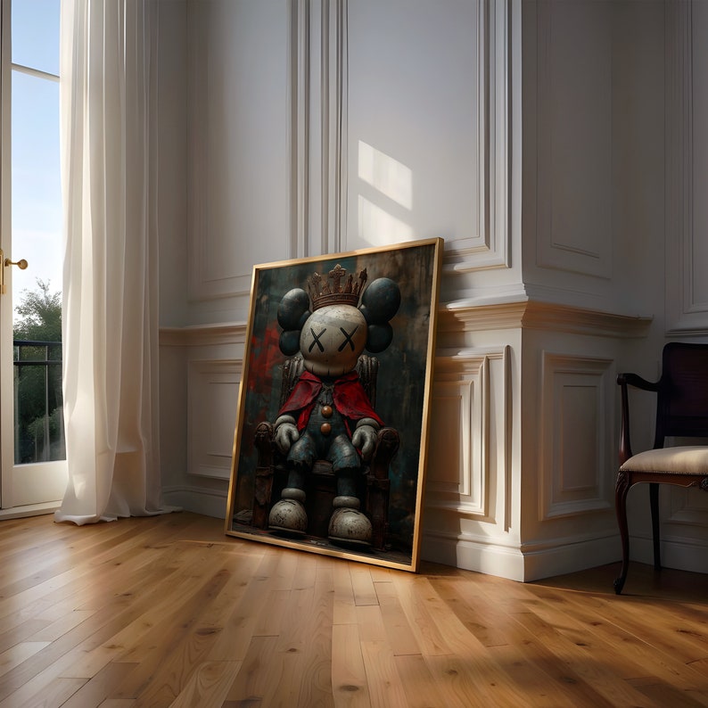 May include: A framed illustration of a cartoon character wearing a crown and a red cape, sitting on a throne. The character has a white face with black X's for eyes.