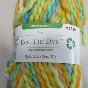 May include: A skein of Eco Tie Dye yarn in a multi-colored tie dye pattern. The yarn is made from recycled acrylic and is 82 yards / 5.3 ounces. The label also states that a pattern is included.