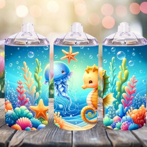 May include: Three stainless steel tumblers with clear lids and handles. Each tumbler features a different underwater scene with a seahorse, a jellyfish, and coral reefs. The tumblers are a light blue color with a white background.