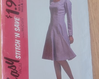 Rare vintage McCall's princess seam, flared dress pattern. Sizes 6-10, factory fold.