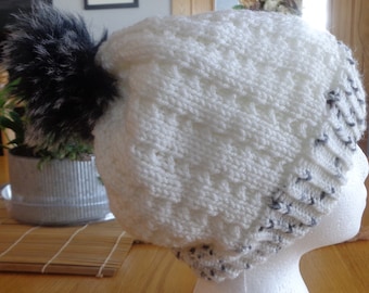 Hand knit slouchy white hat with black fur pom pom