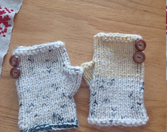 Hand knit fingerless mitts with buttons