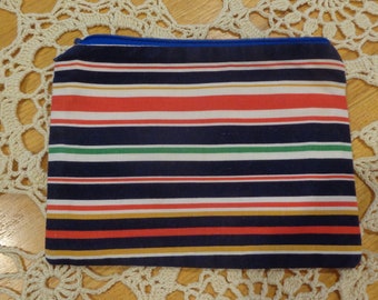Lined striped cotton zipper pouch. 7" x 5".