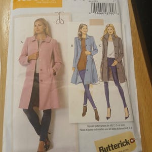 May include: A sewing pattern package featuring a pink coat design, with illustrations of the coat in different colors and styles. The package includes the brand name "lisette" and the pattern number B6385. The Butterick logo is visible.