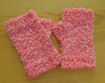 Hand knit pink and white fingerless mitts.