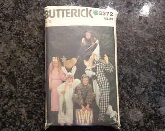 Butterick vintage 3372 misses' Halloween costume pattern.  Size C- misses' 8-18. Princess, rabbit, cat, witch, clown.