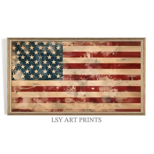 May include: Framed artwork featuring a distressed American flag design. The flag has red and white stripes with a blue field of white stars. The artwork is in a wooden frame and has the text "LSY ART PRINTS" at the bottom.