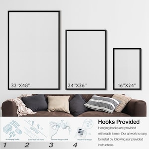 May include: Three framed artworks with black borders of varying sizes: 32"x48", 24"x36", and 16"x24". Below, a brown sofa with pillows and instructions for hanging the artwork are displayed. The text reads "Hooks Provided" and details the hanging process.