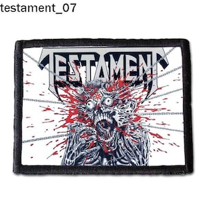 May include: A white patch with a black border features a graphic of a bloody, screaming face with chains and the word "TESTAMENT" in large, bold letters.