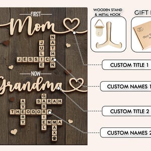 May include: Wooden sign with the words "Mom" and "Grandma" in cursive script, with names spelled out in Scrabble-style tiles. Includes a wooden stand, metal hook, and a gift box with "Best Wishes" printed on it.