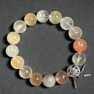 Pulsera de cuarzo translúcido con pelo de conejo: cristal natural (cuentas de 12 mm)