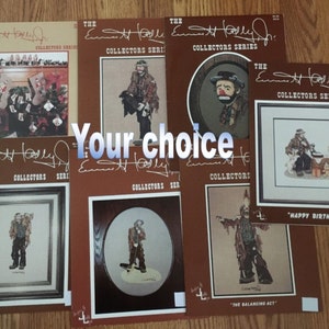 May include: A collection of eight cross-stitch patterns featuring illustrations of clowns and other whimsical characters. The patterns are printed on brown paper with the title "The Ernest A. Holly Jr. Collectors Series" and the artist's signature.