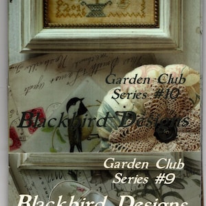 May include: A collection of three cross-stitch patterns from the Garden Club Series by Blackbird Designs. The patterns feature a floral design, a blackbird, and a crocheted flower.