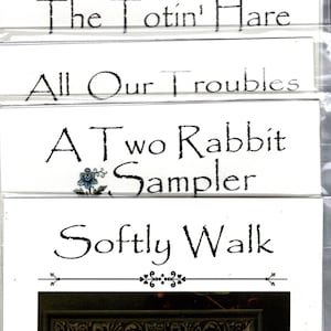 LA-D-DA counted cross stitch chartpack-TotinHare,YellowBird,BisforBunny,TwoRabbitSampler,BriarRabbit,SoftlyWalk,AndRudolf,AllOurTroubles