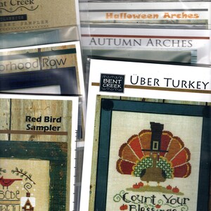 May include: Cross stitch pattern for a Thanksgiving turkey with the text "Count Your Blessings". The pattern is from Bent Creek Classics and is called "Uber Turkey".
