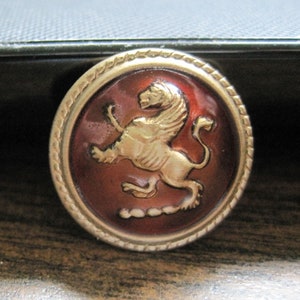 Thirty Metal Shank Buttons With Raised Horse or Mythical Creature Brown Enamel