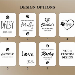 May include: A selection of white rectangular designs featuring black text and paw prints. The designs include names such as "Daisy," "Molly," "Charlie's," "Buddy," "Casper," "Love," and "Rocky," along with dates and phrases like "Memory Box."