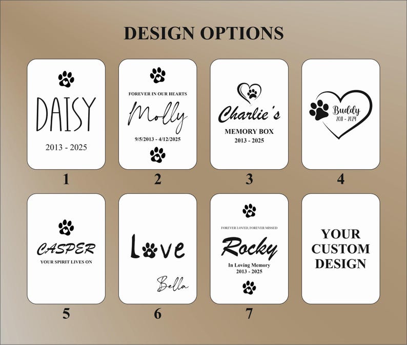 May include: A selection of white rectangular designs featuring black text and paw prints. The designs include names such as "Daisy," "Molly," "Charlie's," "Buddy," "Casper," "Love," and "Rocky," along with dates and phrases like "Memory Box."
