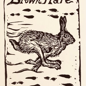 May include: Black and white woodcut print of a brown hare running, with the text "Brown Hare (Lepus europaeus)" above it.